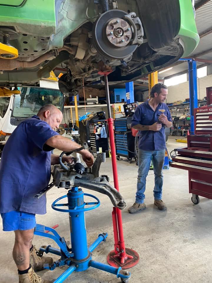 Two Mechanics Repairing The Truck — Towing Service In Dubbo, NSW