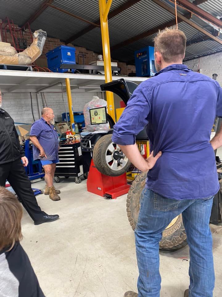 Group Of Men Checking The Car Diagnostics — Towing Service In Coonabarabran, NSW
