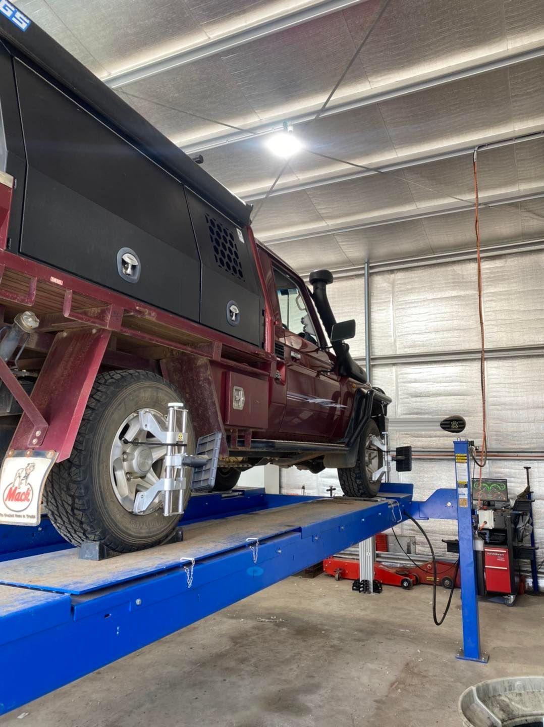 Vehicle Stand With Sensor Wheels For Alignment — Towing Service In Nyngan, NSW