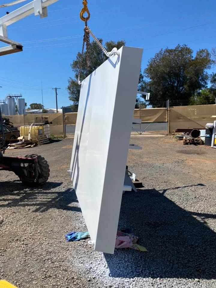 New Painted Parts Of The Truck On Open Area — Towing Service In Coonabarabran, NSW