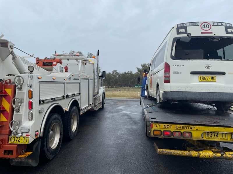 Two Tow Trucks Parked — Towing Service In Coonabarabran, NSW