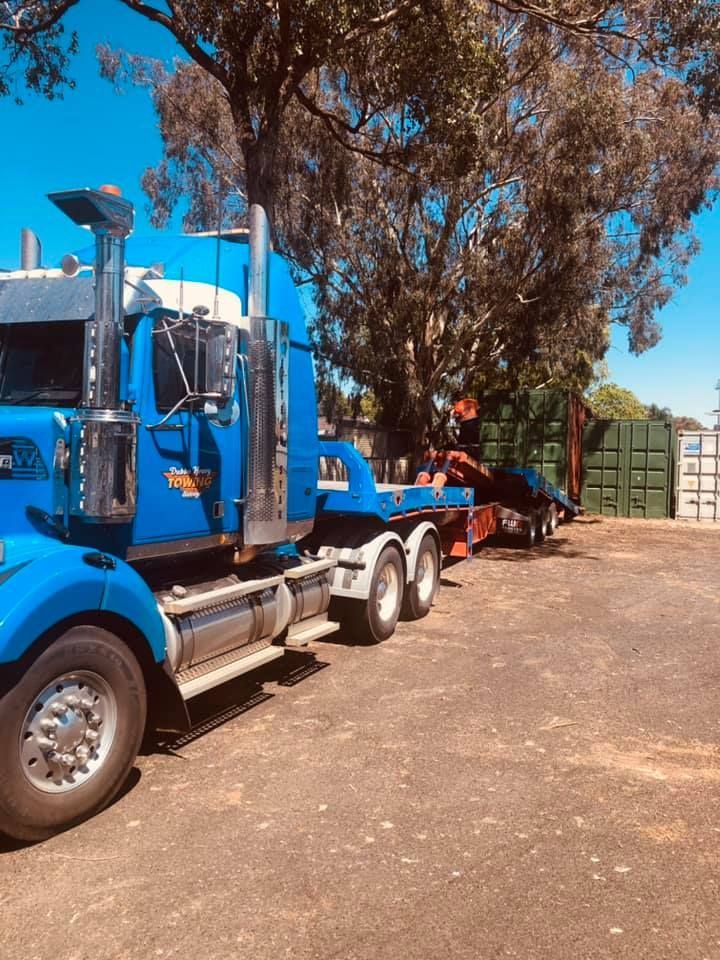 Blue Tow Truck With Trees At The Back — Towing Service In Dubbo, NSW