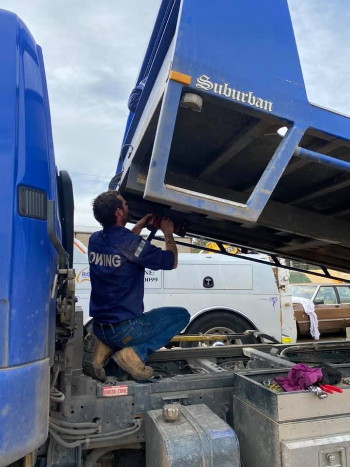 Man Repairing The Blue Truck — Towing Service In Dubbo, NSW