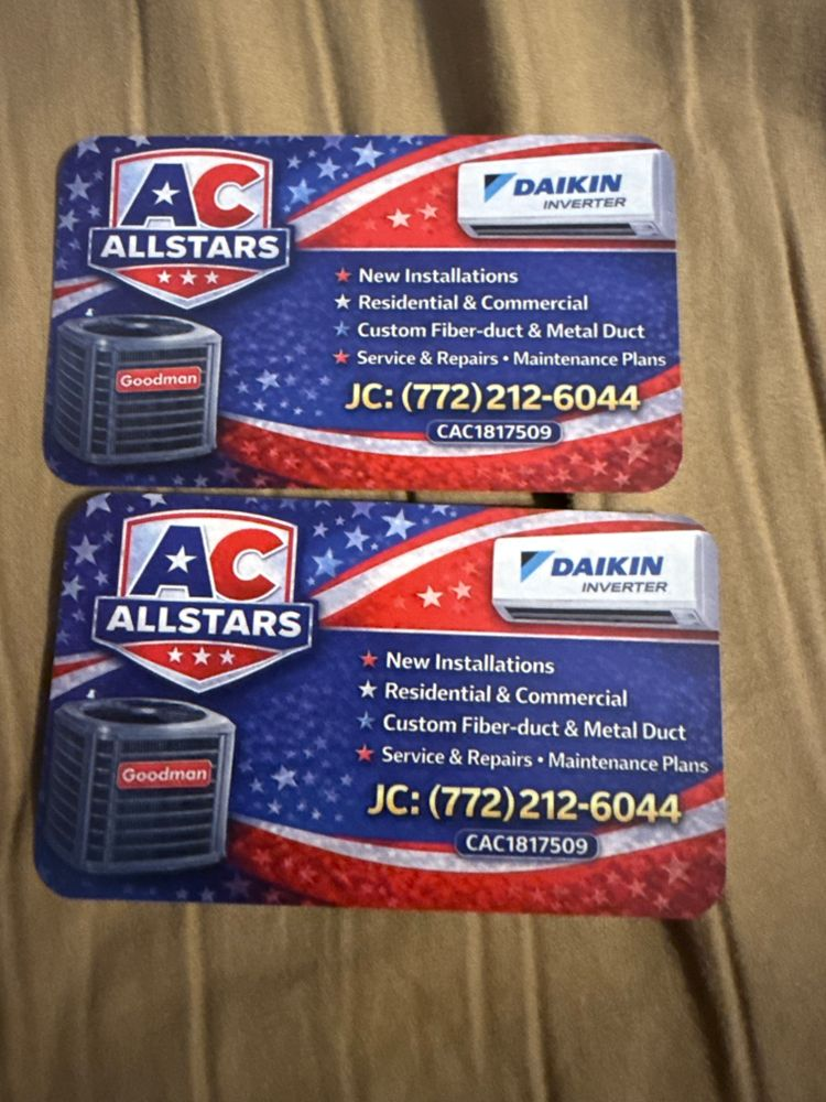Two red-and-blue AC Allstars HVAC business cards with contact number and Daikin logo