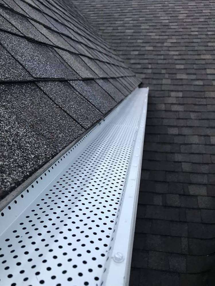 Aerial view of a second story residential roof installed by Roofing Company Four Season Roofing