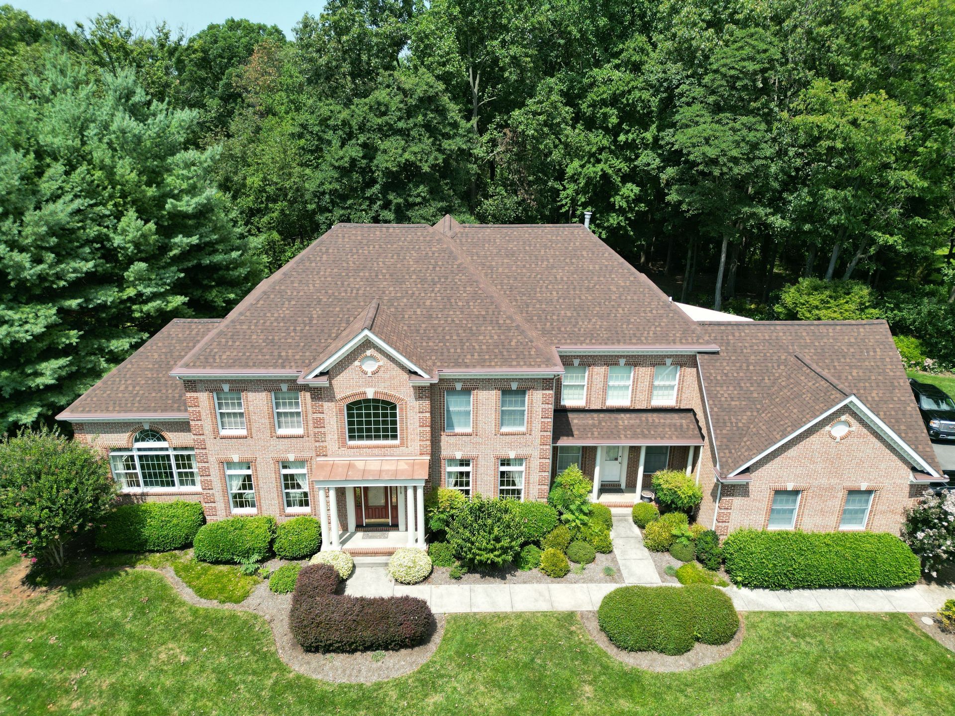 Finished roof replacement project in Finksburg, MD, with durable materials for year-round weather protection.
