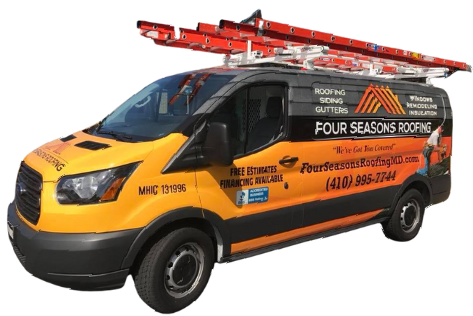 A yellow van with a ladder on top of it for four seasons roofing.