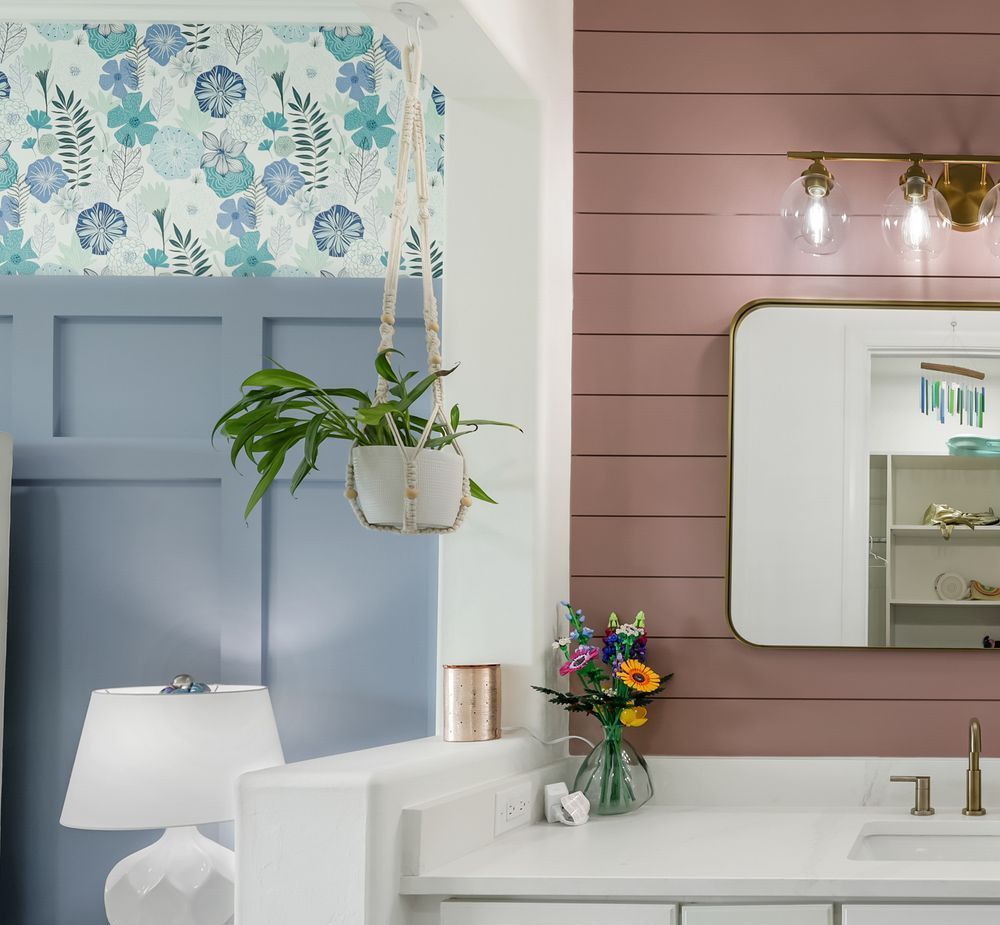 Wallpaper accent niche with shelving and plant styling