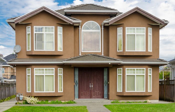 the exterior of a large two storey house
