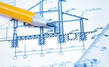 an architectural drawing and a pencil
