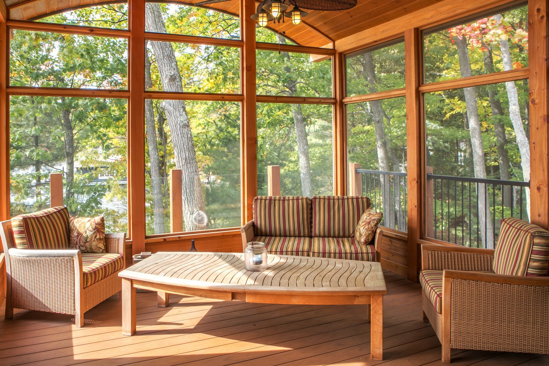Inside a sunny porch with wood trimmings