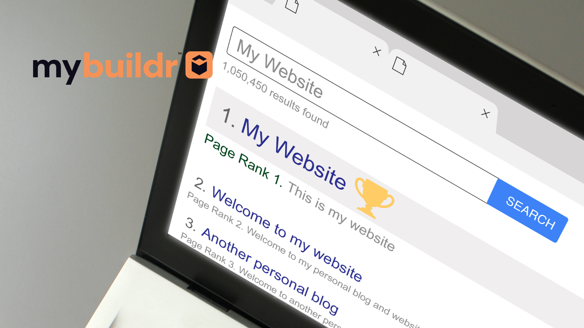 A laptop is open to a page that says my website