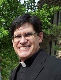 Pastor Jim (in clerical collar)