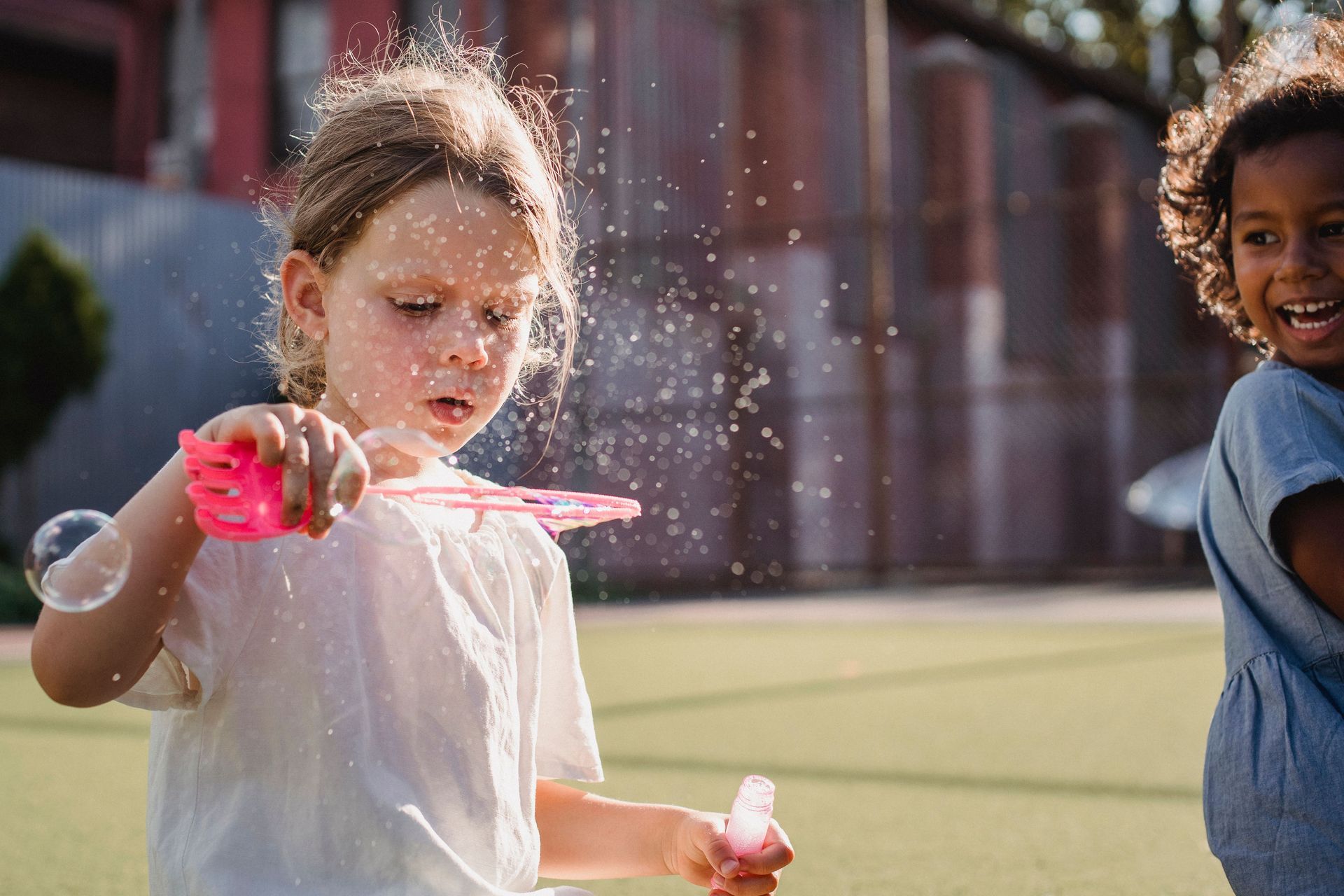Children playing with bubbles in Milford, CT