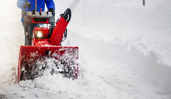 Worker Using Snow Blower | Springfield, MA | Thomas P. Ryland Co. Worker Using Snow Blower | Springfield, MA | Thomas P. Ryland Co.