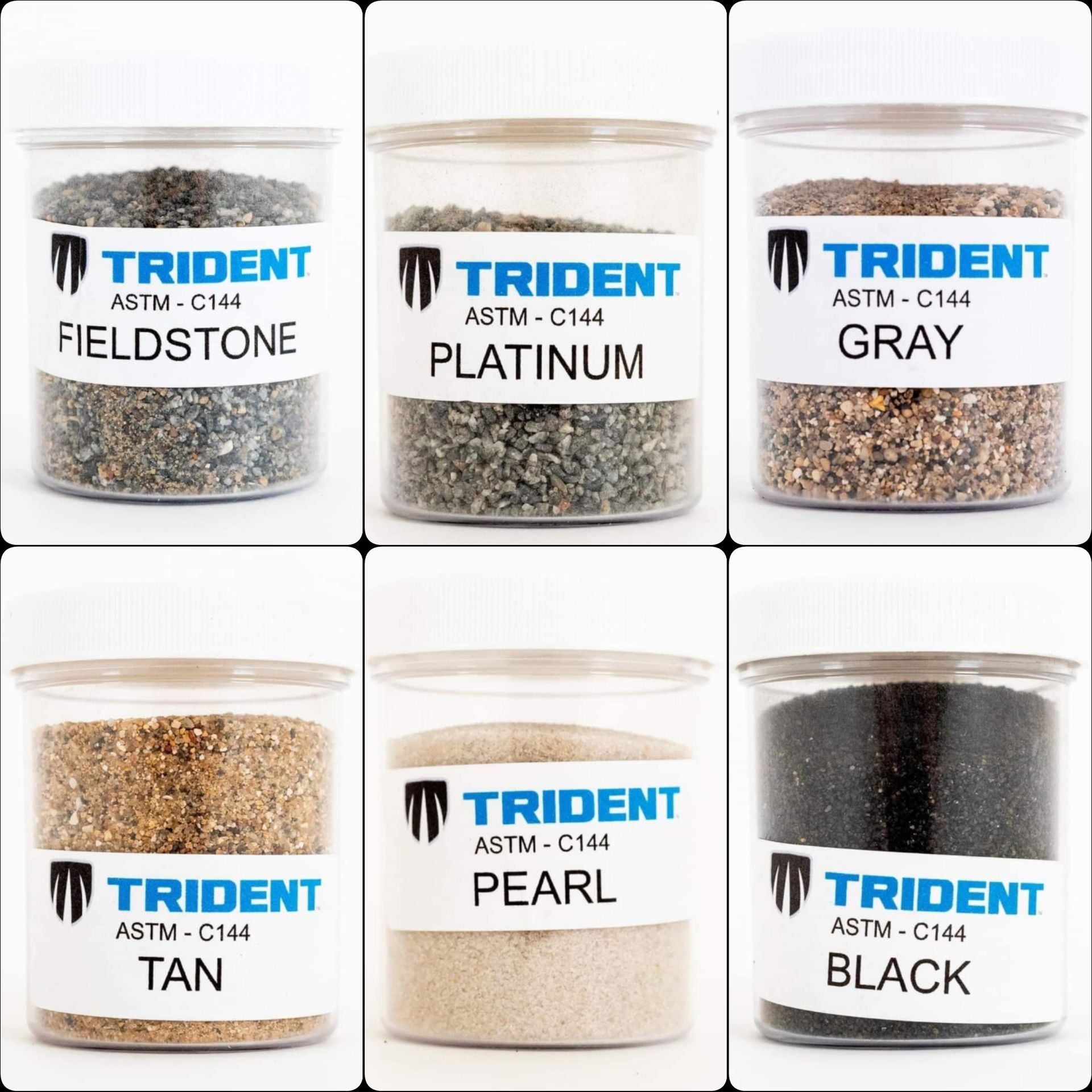 Six small jars of colored sand, labeled
