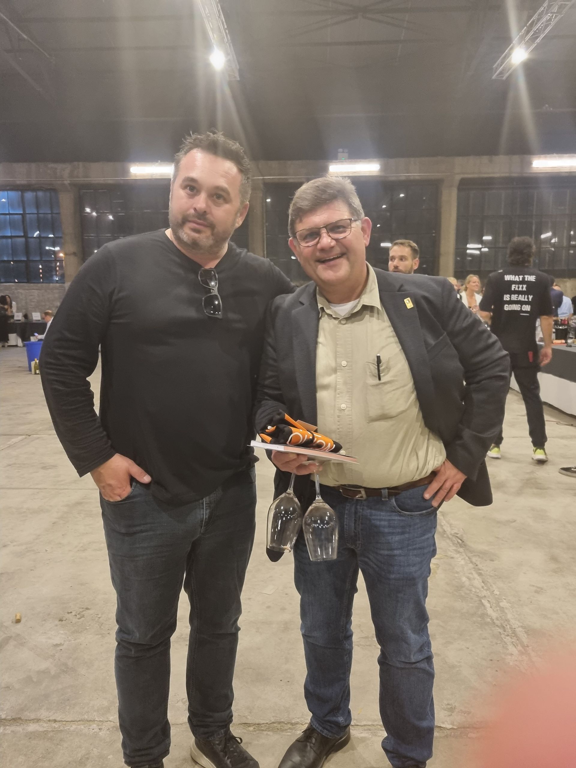 Giorgos and Thymiopoulo posing at an event