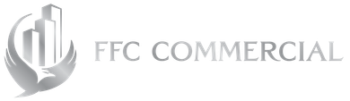 A silver logo with a stylized eagle and skyscrapers, next to the text