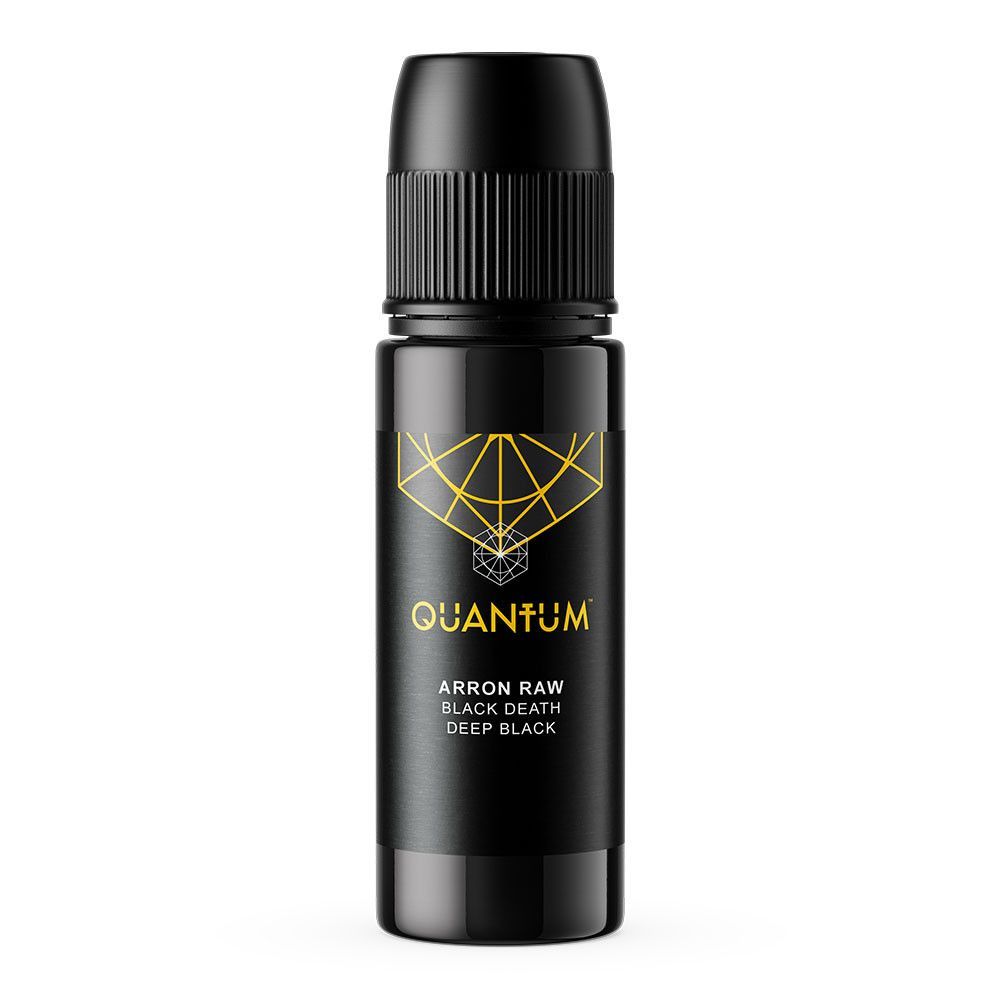 A black bottle of Quantum tattoo ink with gold branding, centered on a plain black background.