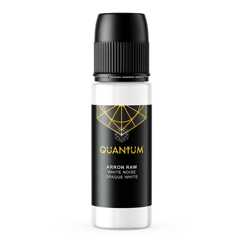 A white plastic bottle of Quantum tattoo ink with a black label, gold geometric design, and black pointed applicator tip.