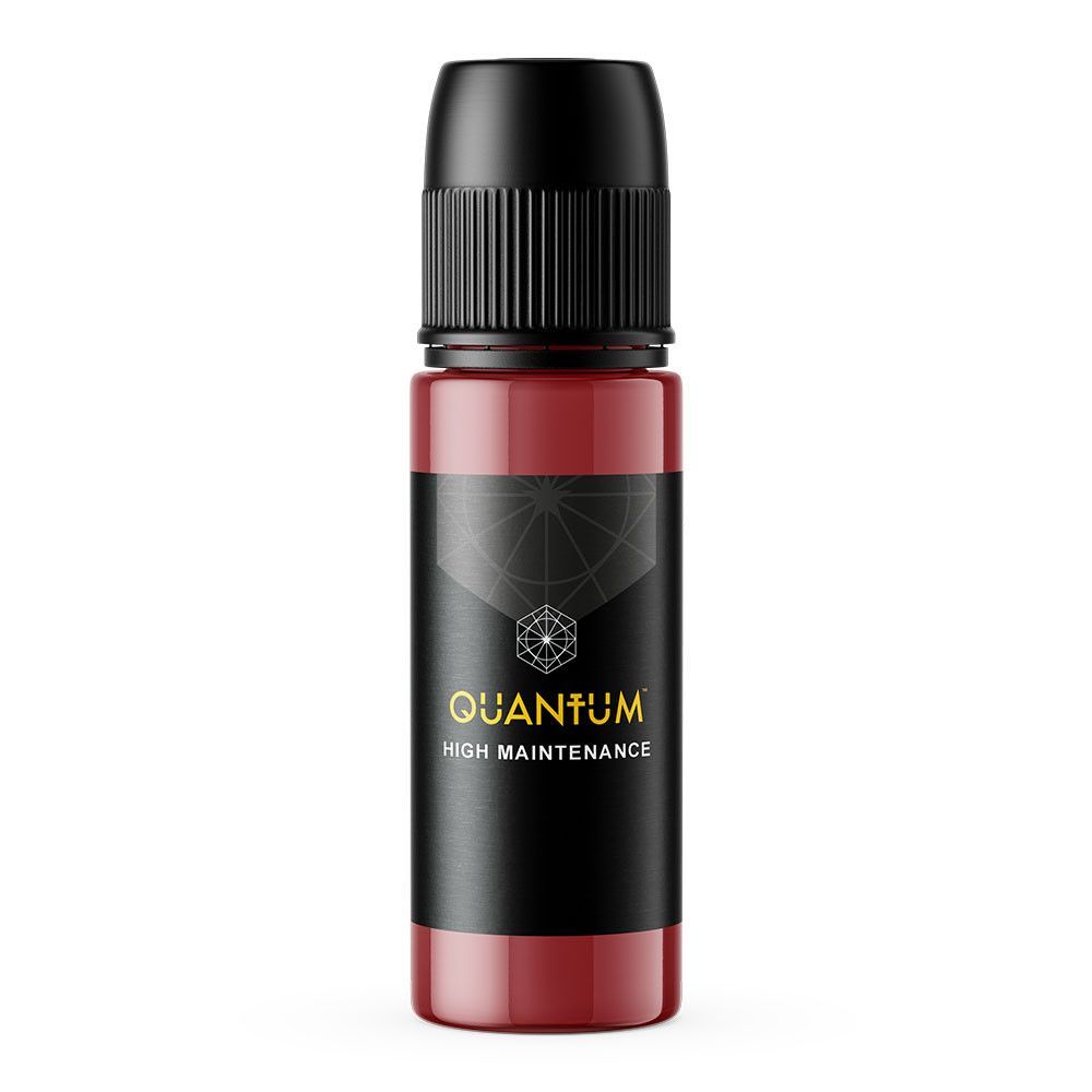 A small, cylindrical bottle of Quantum High Maintenance pigment with a black cap and dark red liquid contents.