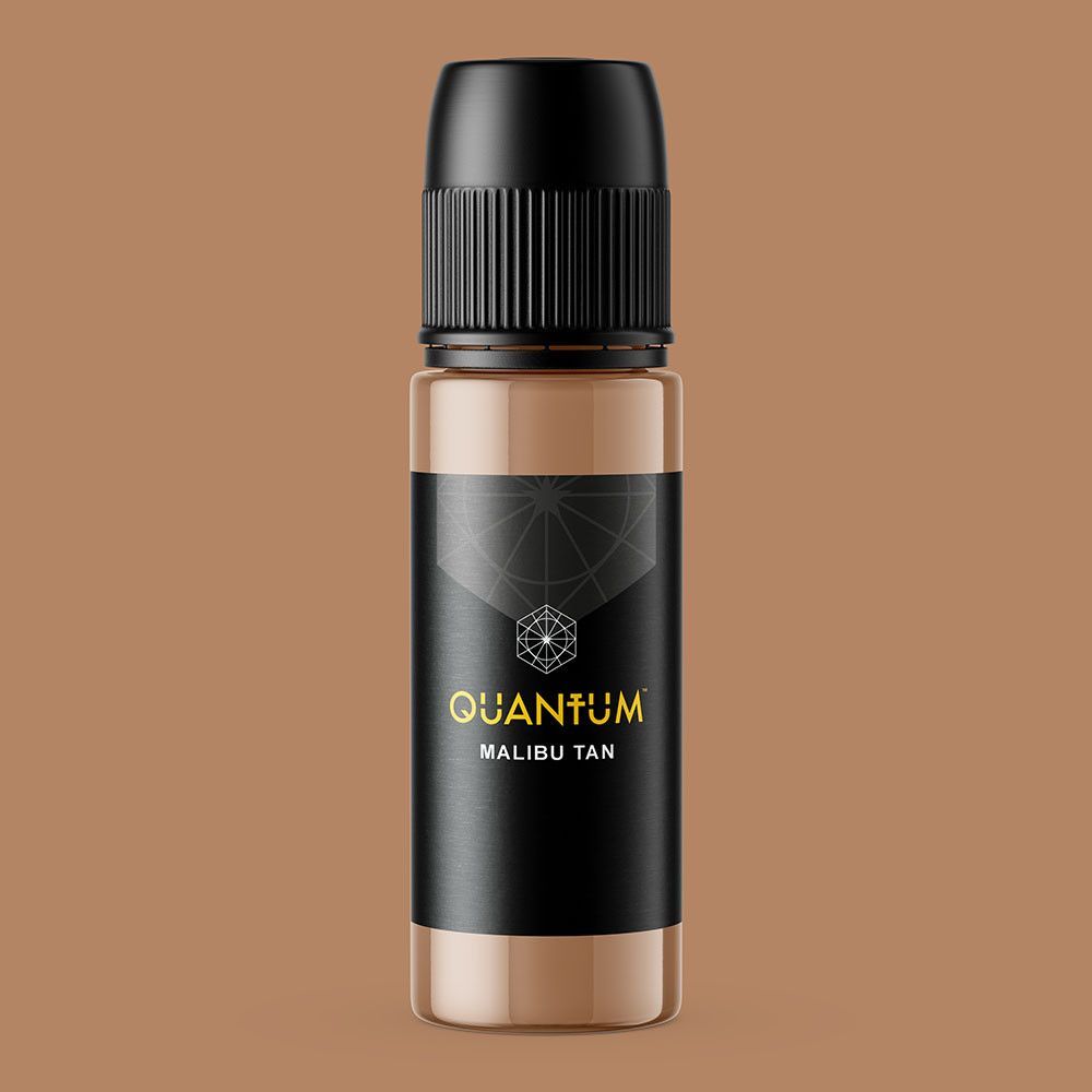 A bottle of Quantum Malibu Tan pigment ink, featuring a black label with gold text on a tan-colored liquid bottle.