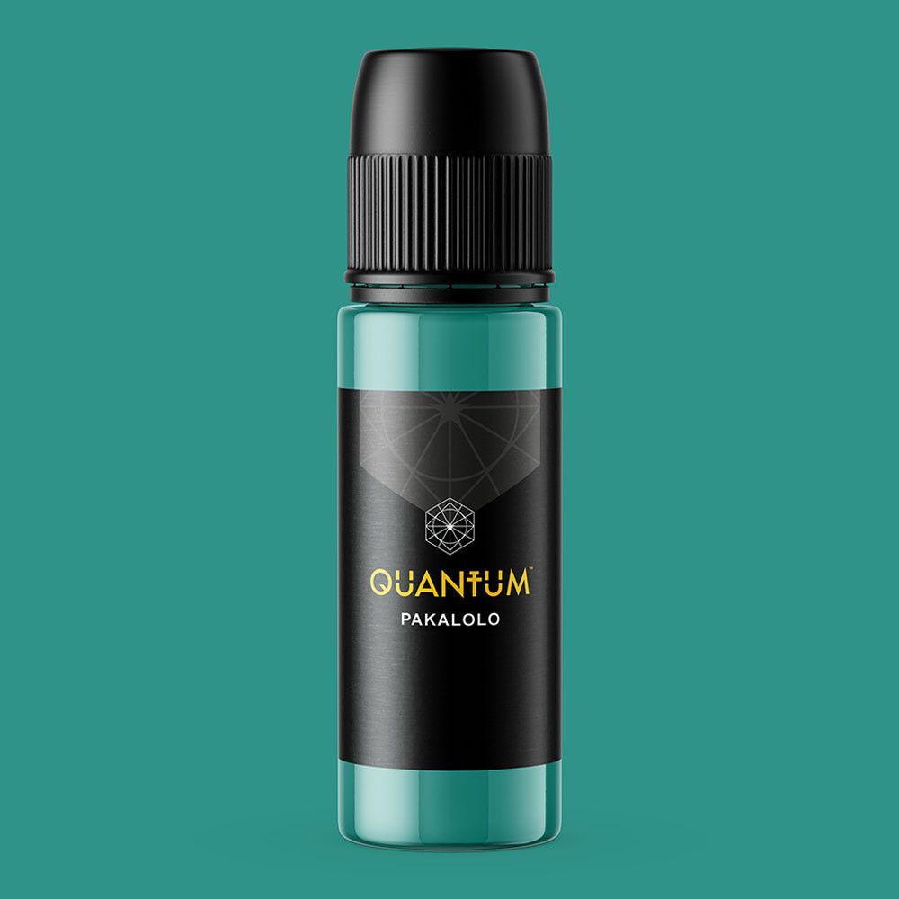 A teal-colored bottle of Quantum brand tattoo ink, labeled