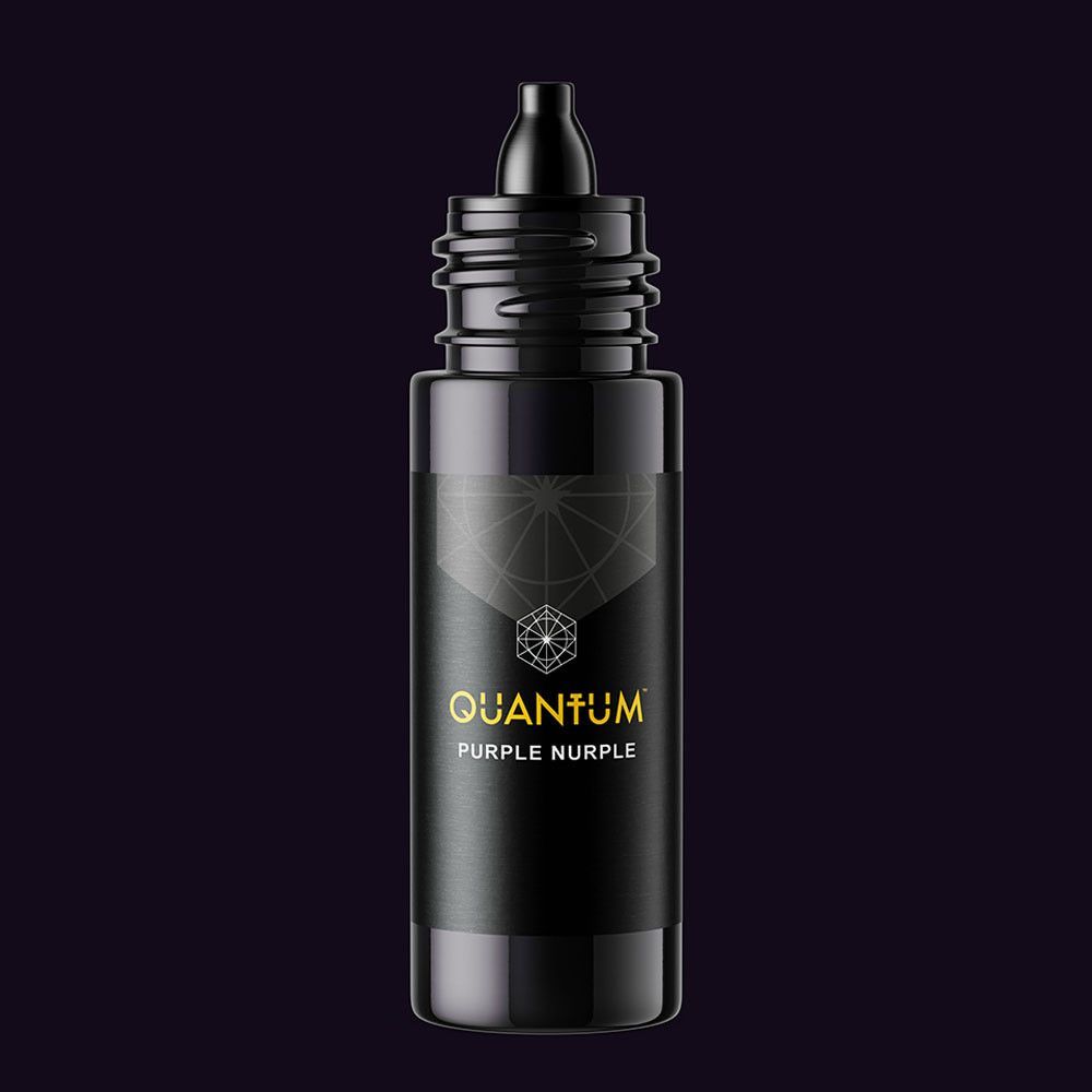 A black dropper bottle of Quantum tattoo ink labeled