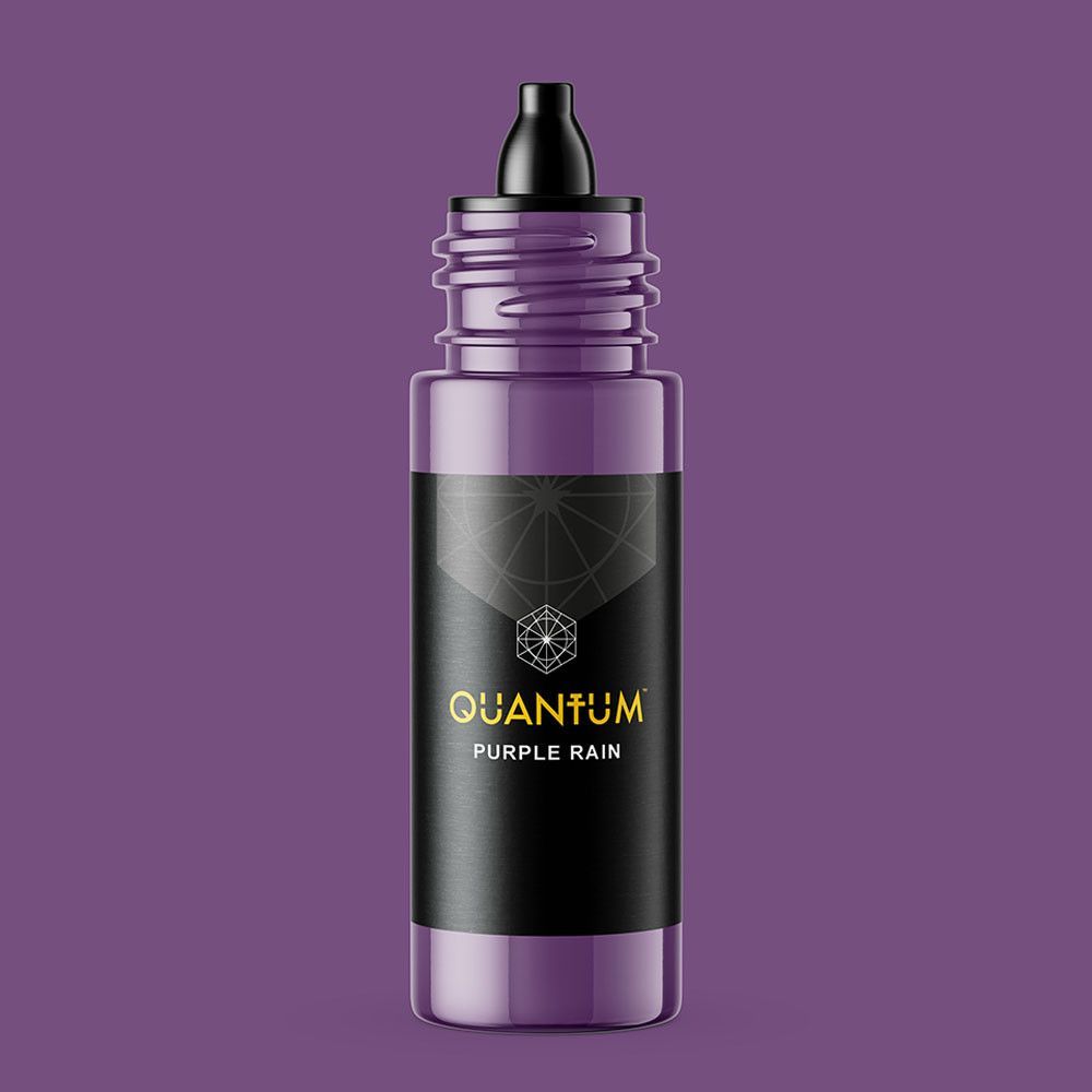 A bottle of Quantum brand tattoo ink in the color