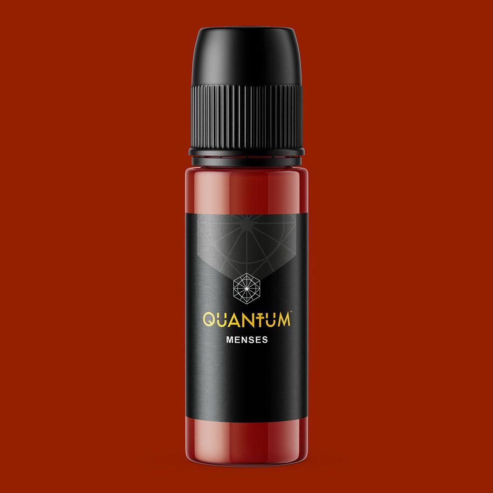A red bottle of Quantum brand permanent makeup pigment with a black cap and label on a white background.