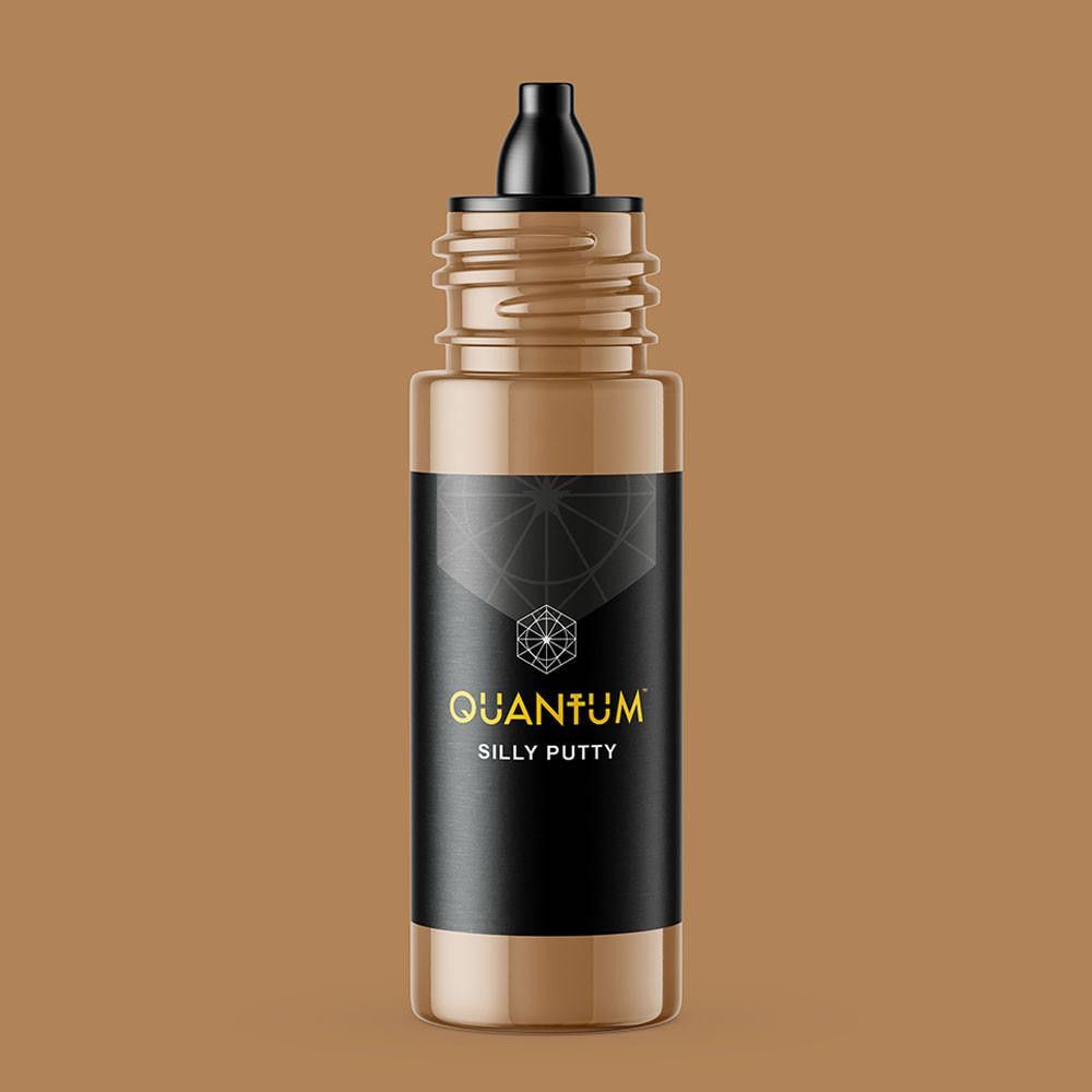 A brown-colored squeeze bottle with a black cap and a label reading