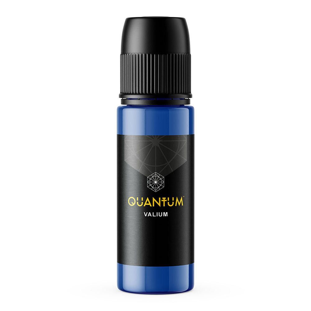 A blue squeeze bottle with a black cap, featuring a black label that reads