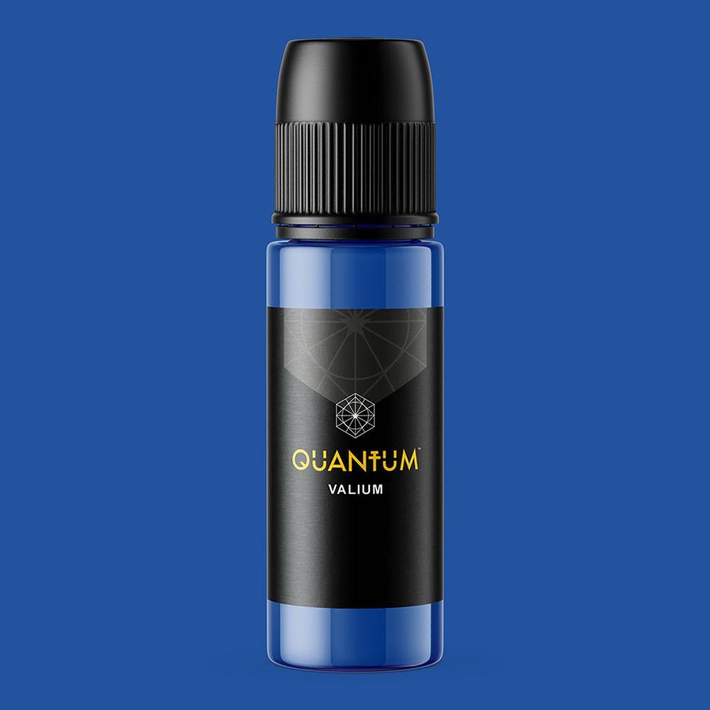A blue squeeze bottle with a black cap, featuring a black label that reads