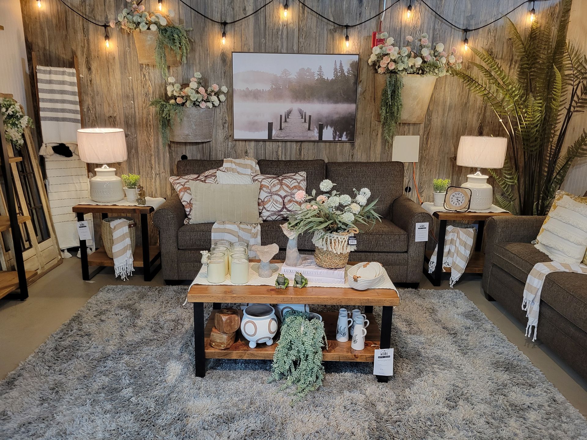 A cozy living room display showcasing a variety of home furnishings and accessories.