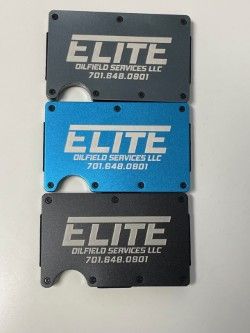 Three Elite Energy Services LLC license plates stacked vertically in black, blue, and black.