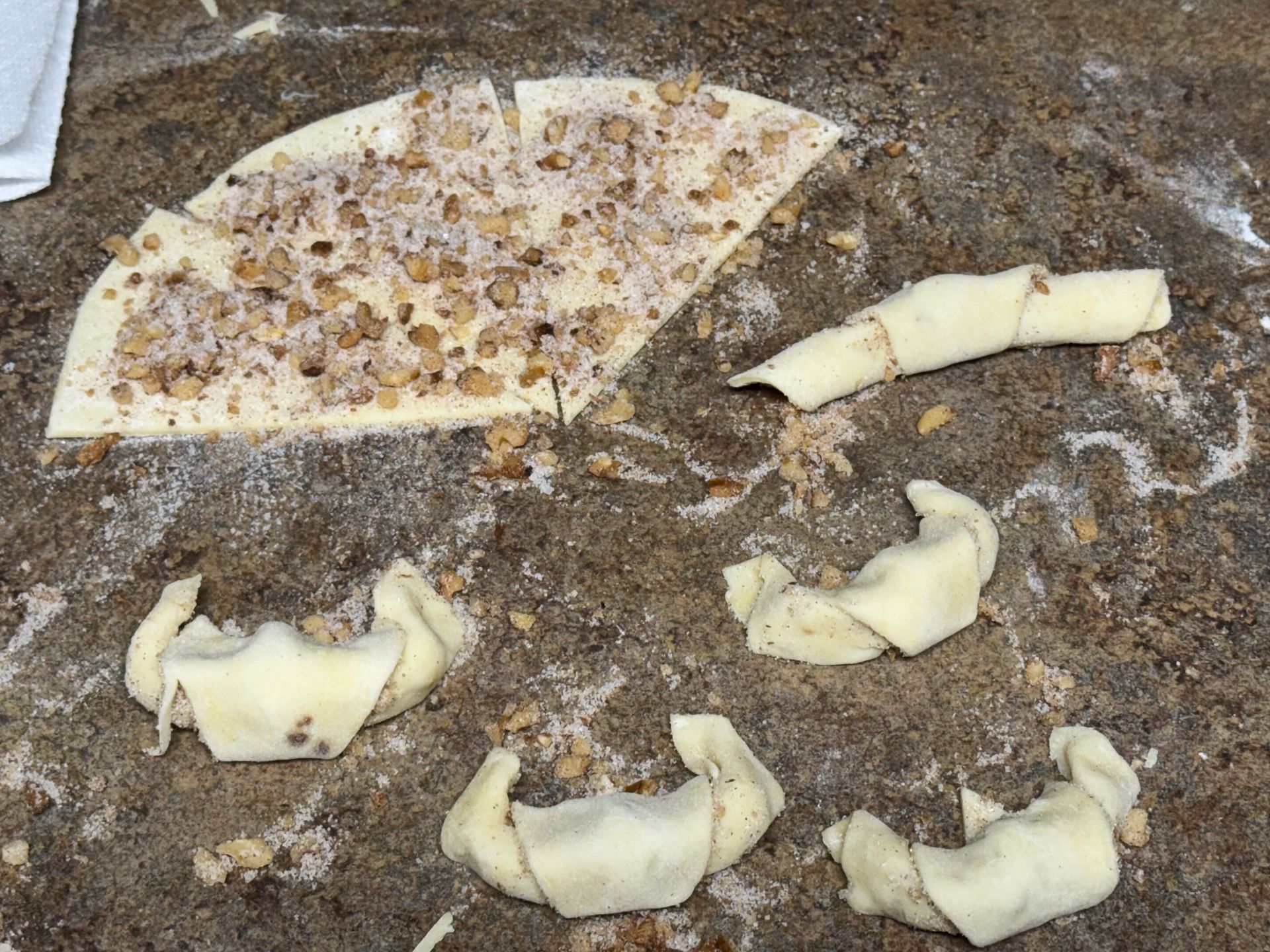 rolling the butternut cookies into shape