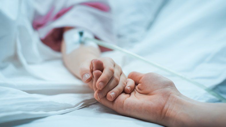 Holding Hands with Patient — Boambee East NSW — Coffs Hypnotherapy