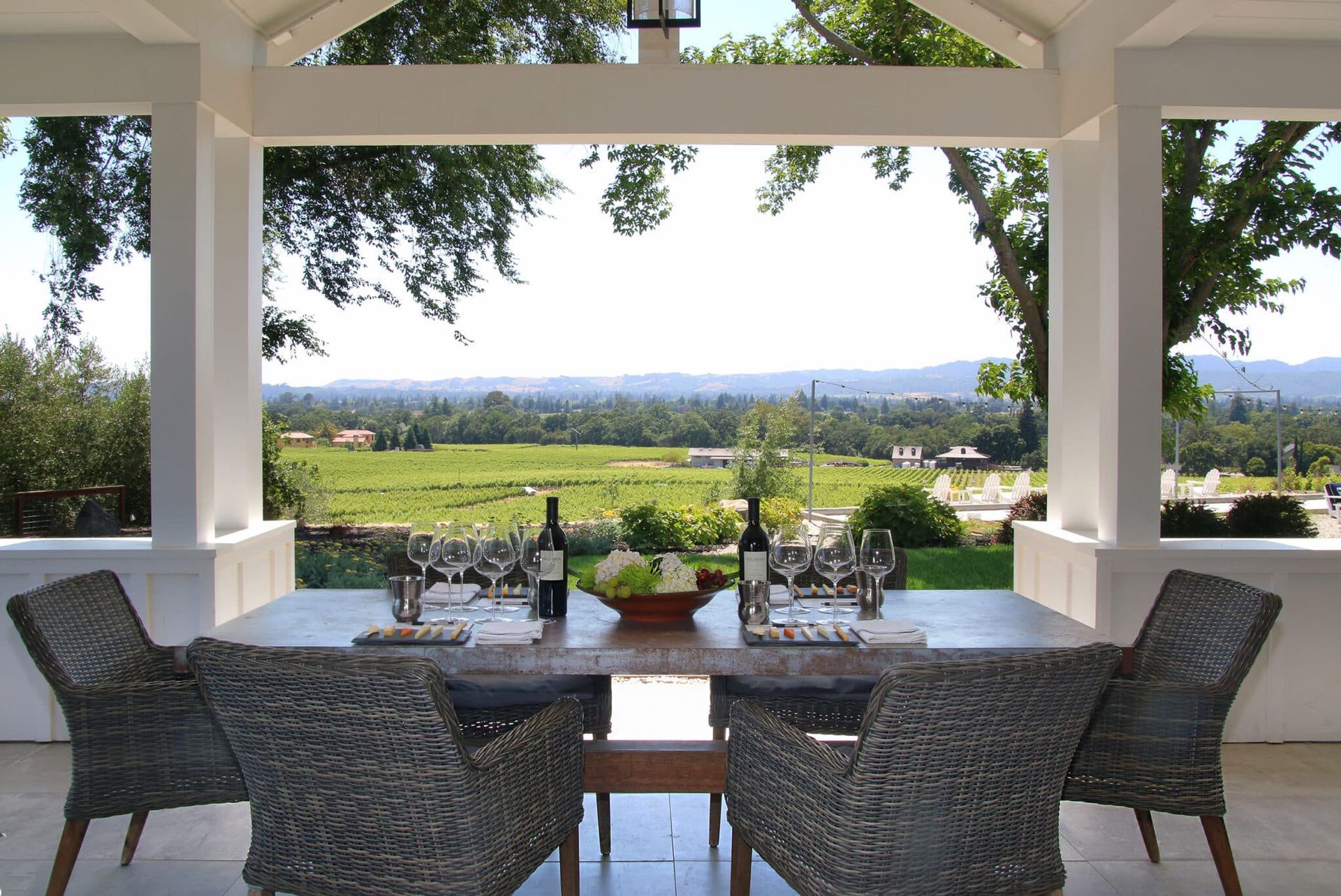 A table with a bottle of wine on it