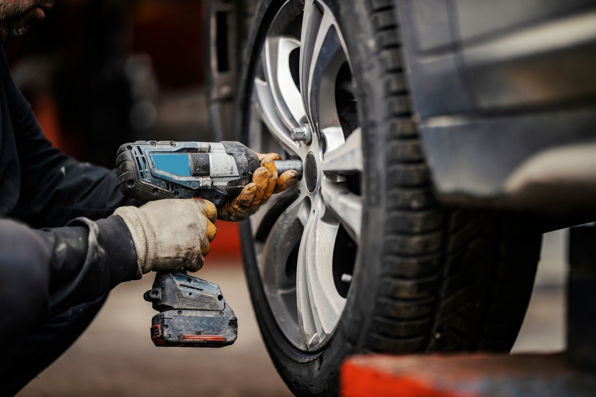 Car wheel installation in vulcanizing workshop. Car wheel installation in vulcanizing workshop.