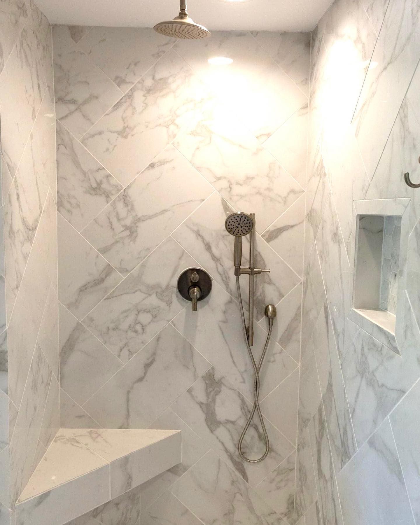 newly renovated white marble shower