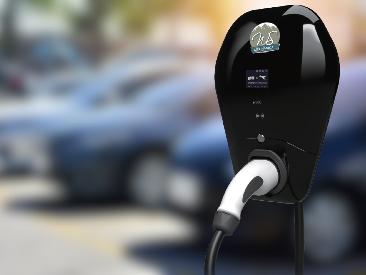 An electric car is being charged at a WS Mechanical charging station