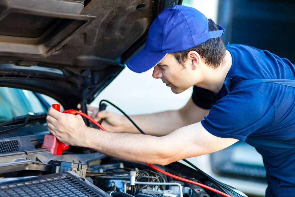 Professional Car Mechanic Working Repair Car  — Glenn Rowe Auto Electrics In Coolangatta, NSW