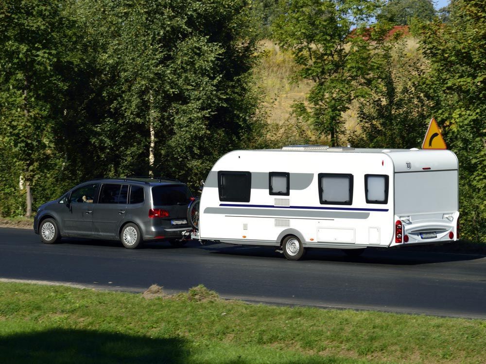 Car With Caravan — Glenn Rowe Auto Electrics In Coolangatta, NSW