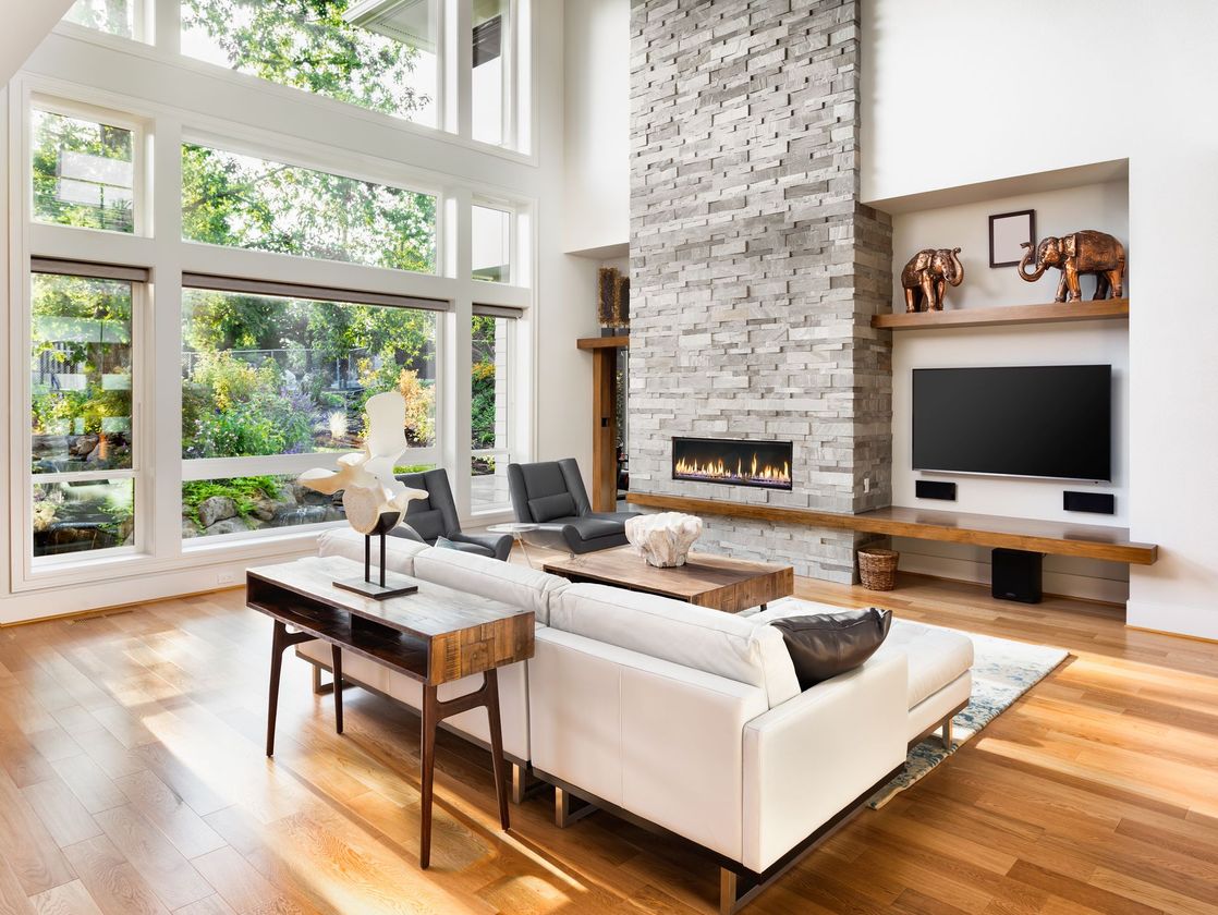 modern living room with stone fireplace