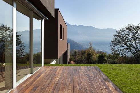 modern house with wood patio