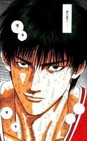 A close up of a man 's face in a basketball manga.