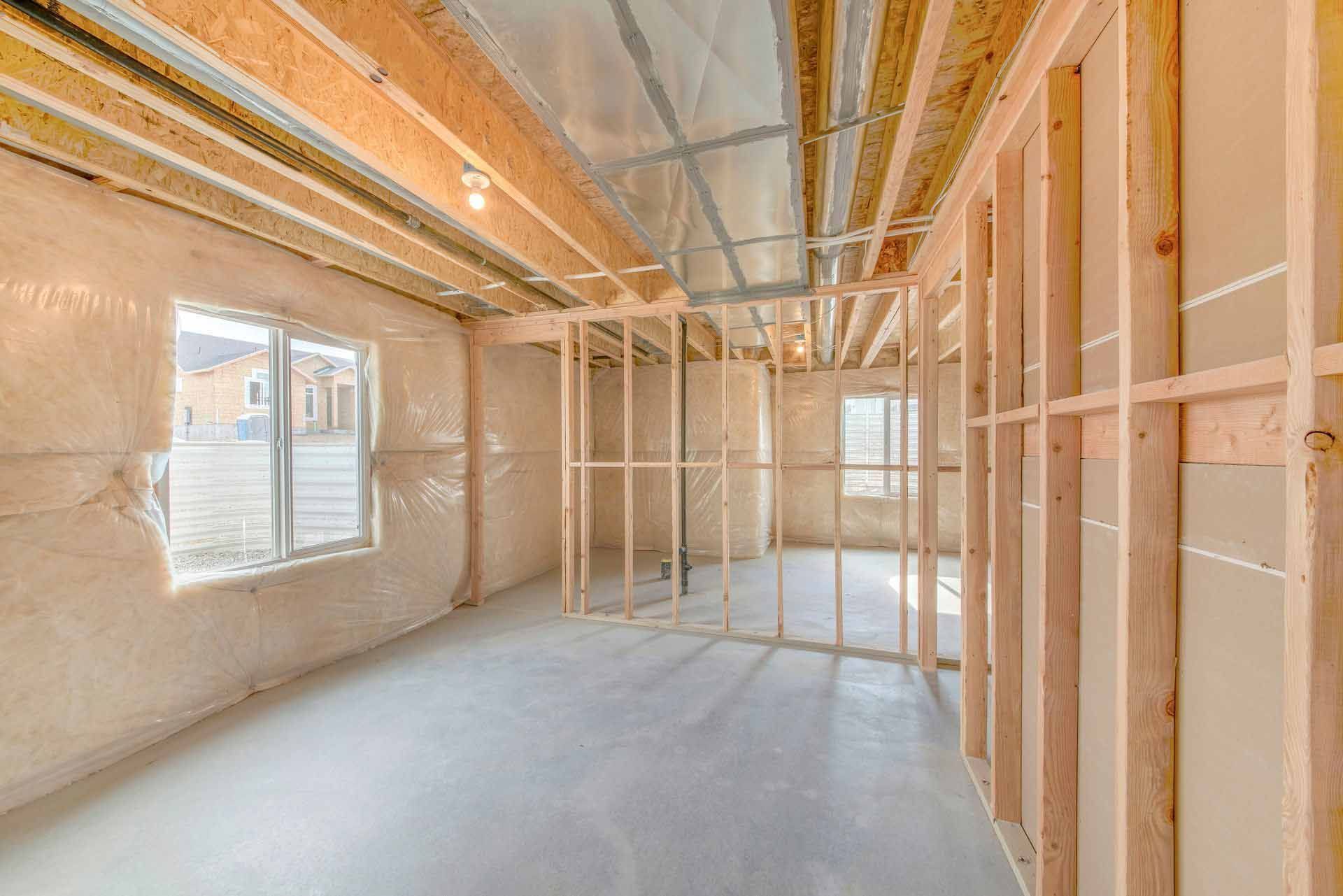 Wooden beams and walls of a home prior to installing insulation