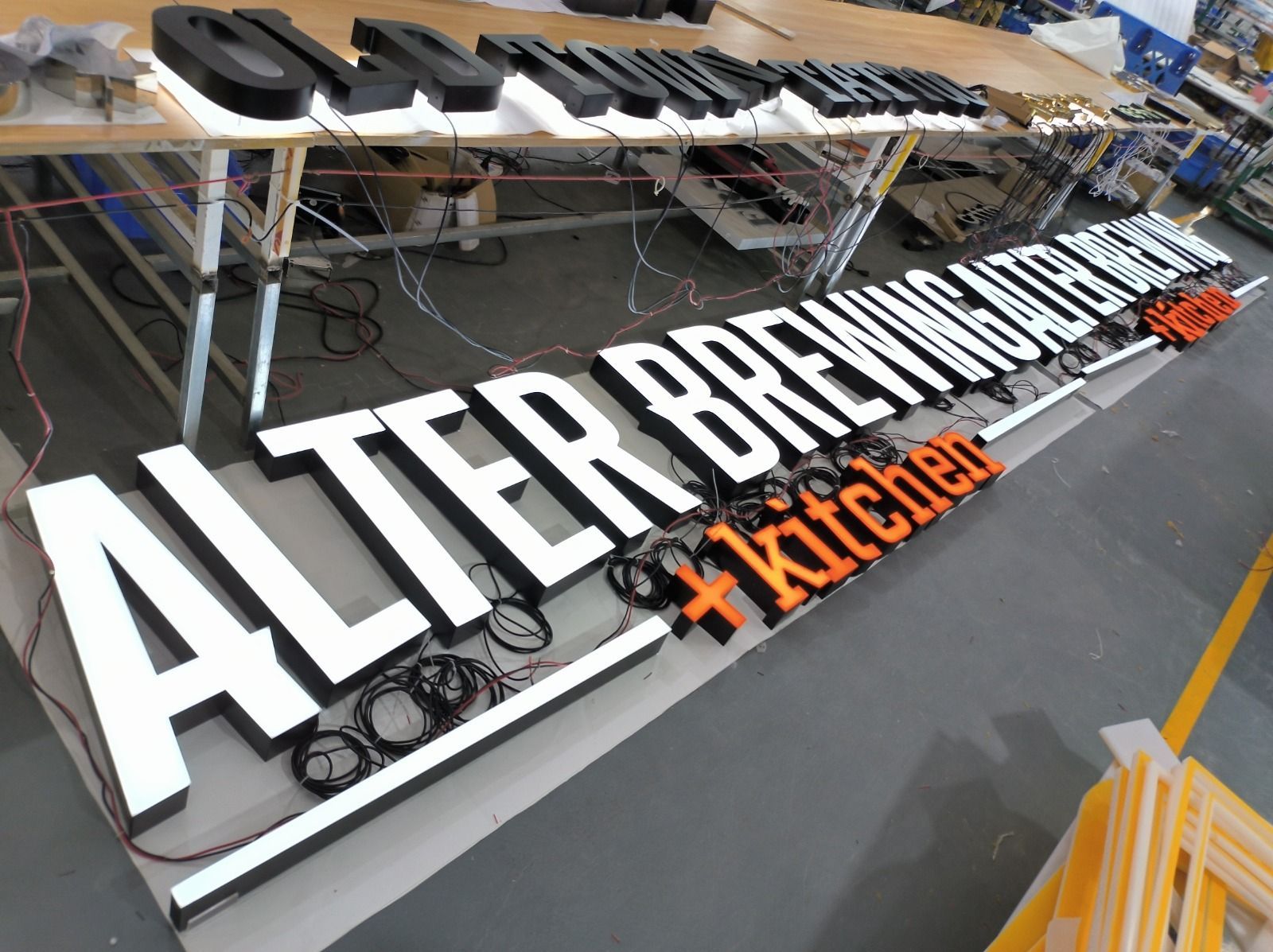 trimmless front lit channel letters - alter brewing and kitchen exterior signage