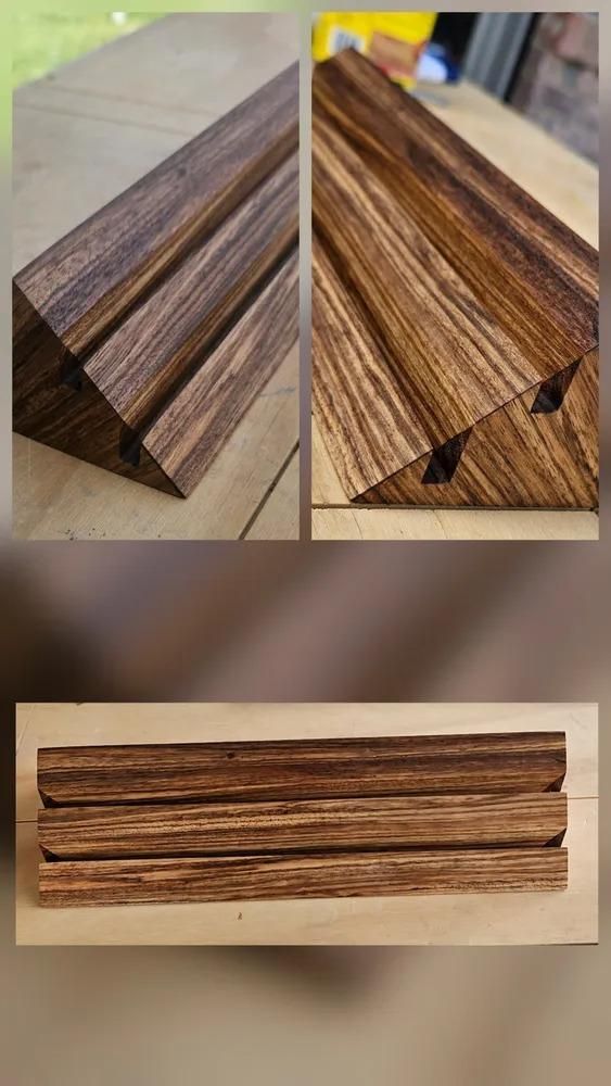Dark brown striped wooden planks shown from two angles on a light background