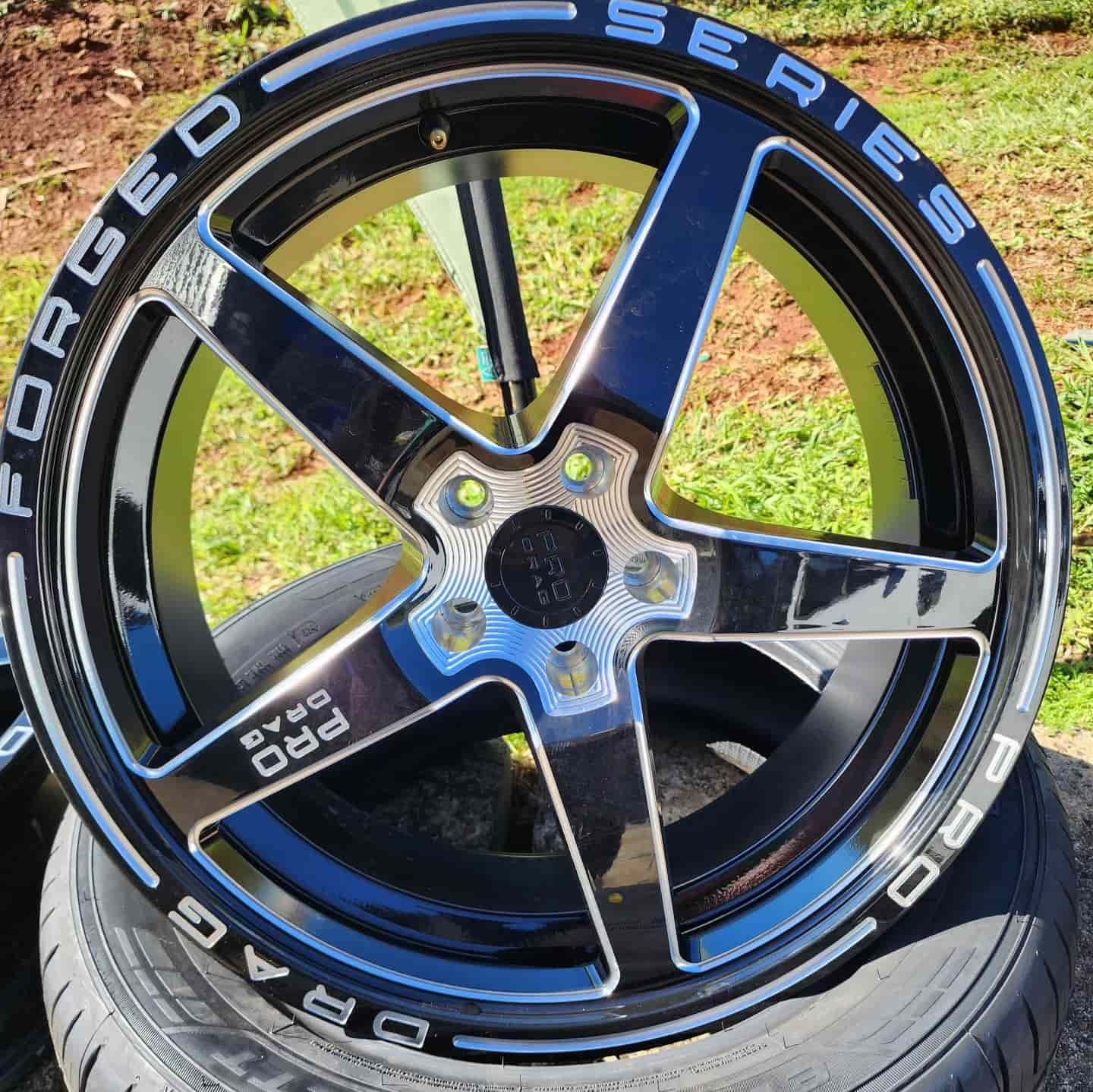 Black and Chrome Forged Drag Racing Wheel With White Lettering — Plateau Tyres in Lennox Head, NSW
